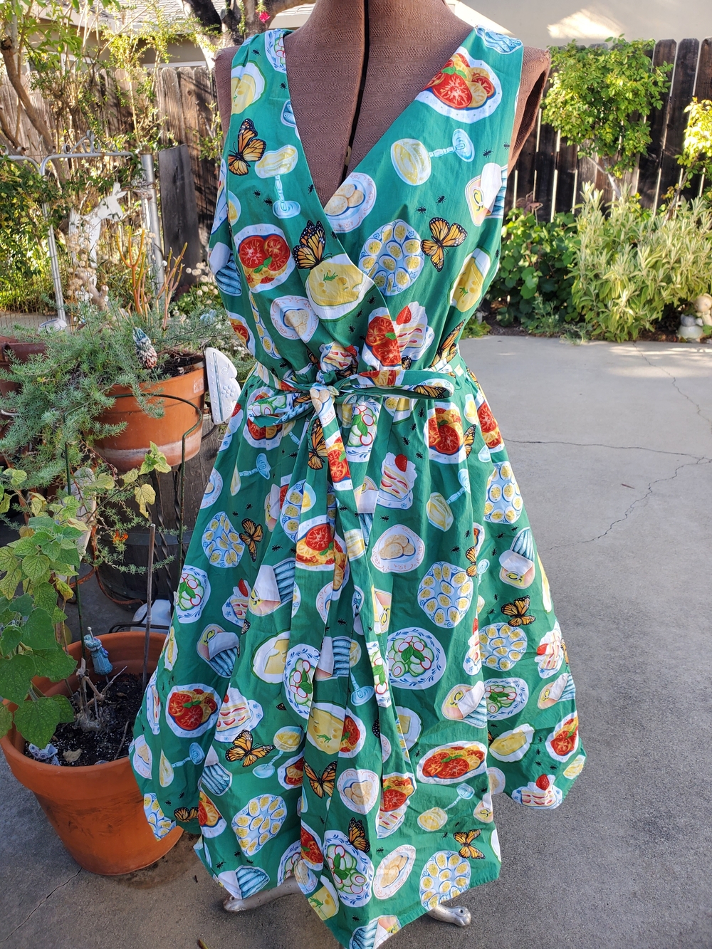 Modcloth Green Sleeveless Wrap Dress with Playful Food & Butterfly Print